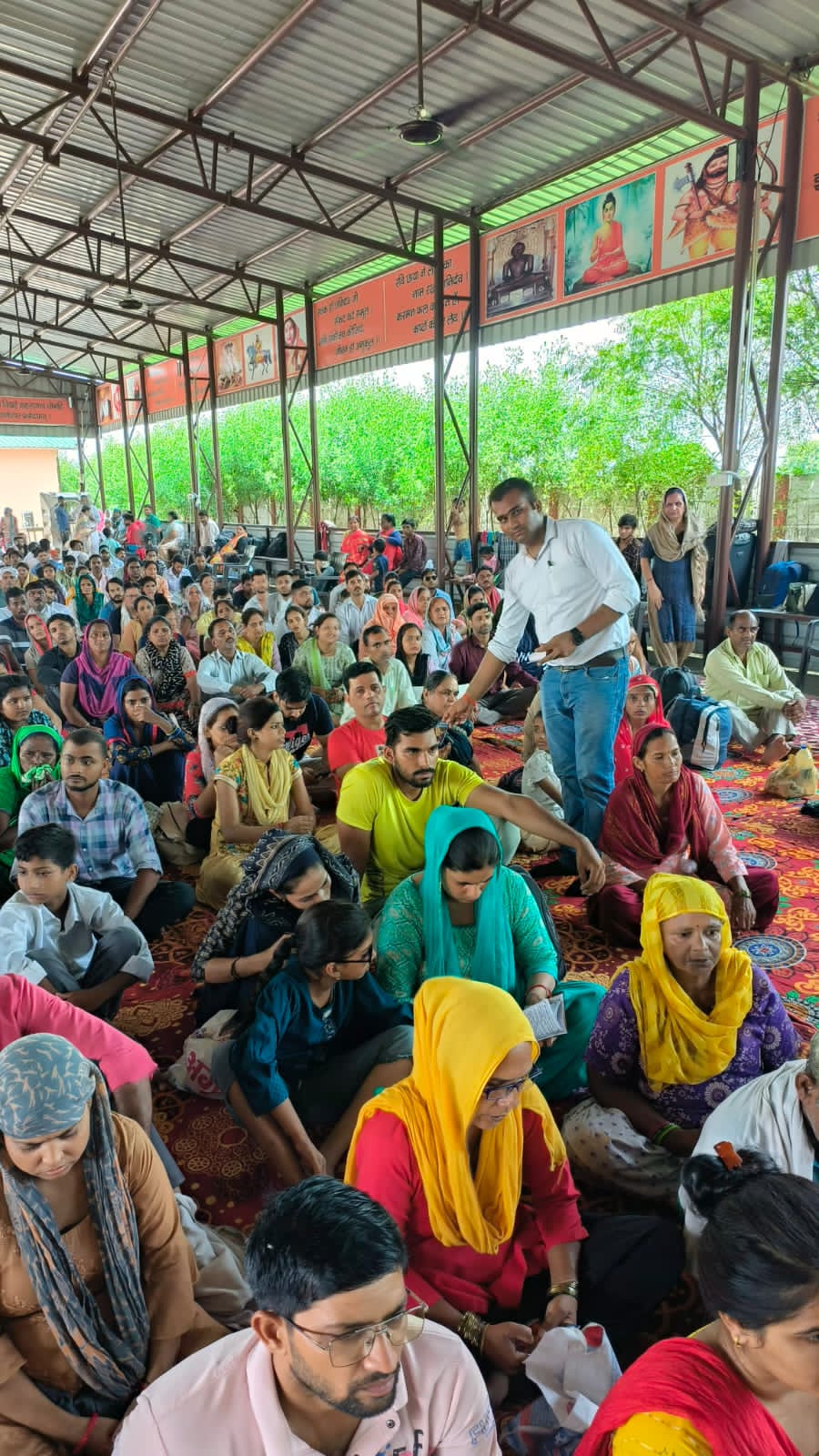 Gramin Pustak Daan book and stationery distribution drive in rural community by Maa Shashi Foundation
